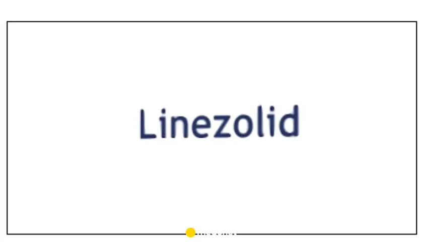 Napis "Linezolid" w kolorze granatowym na białym tle. Pod napisem znajduje się żółta kropka i fragment tekstu.