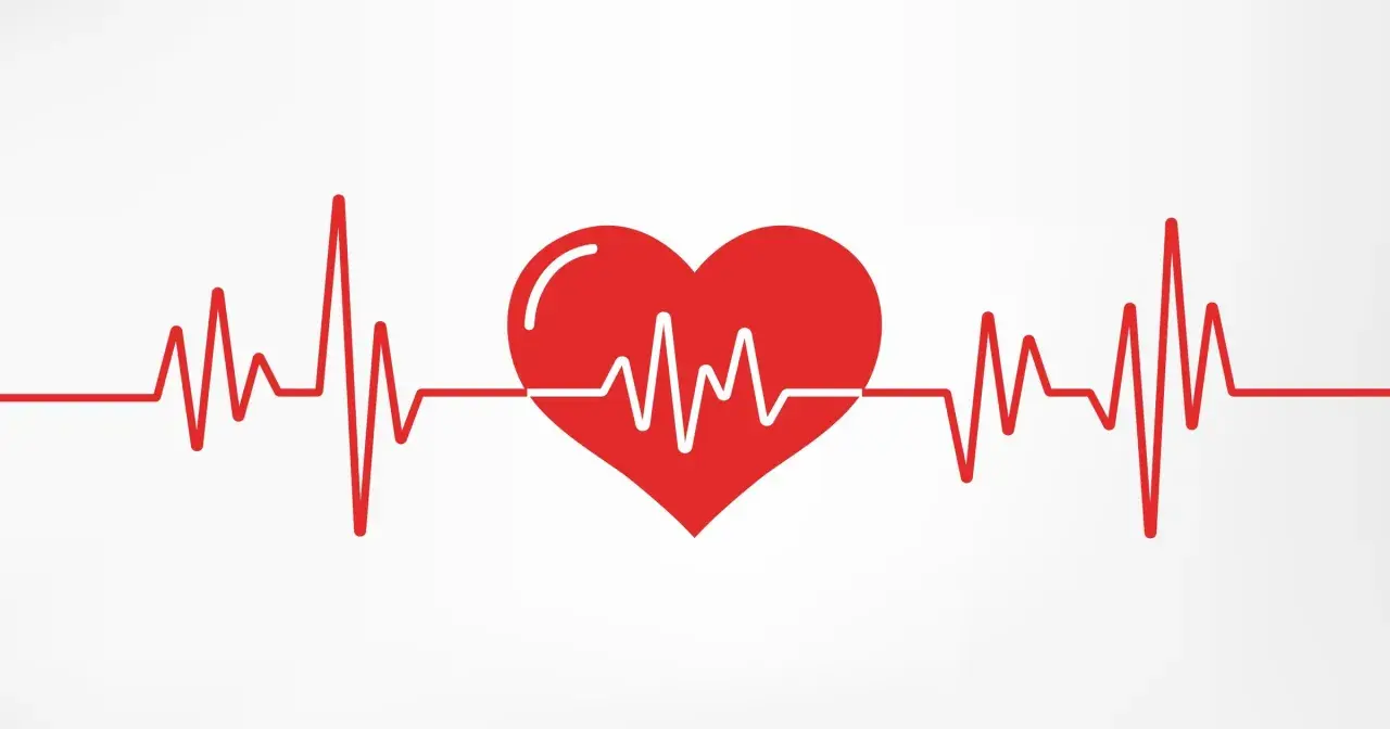 Czerwone serce z linią EKG symbolizującą tętno.